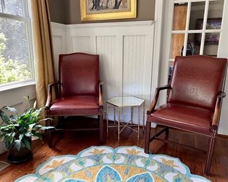 Taylor Chair Co leather armchairs; plant; accent table