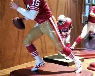 San Francisco 49ers quarterback Joe Montana (16) runs from the pocket at Super Bowl XXIV in 1989 in New Orleans. San Francisco 49ers quarterback Joe Montana warms up for play October 22, 1989. San Francisco 49ers quarterback Joe Montana (16) sets for play before an NFL football game in his rookie year in 1979.