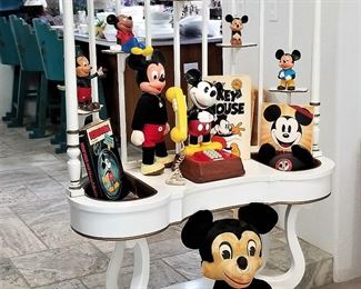 Unusual furniture mid-century modern display piece. It has 2 copper inserts great for live plants or faux plants or... These are a few of the Disney and Mickey Mouse collectibles featured here. We have much more.
