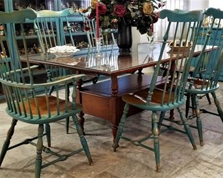 Beautiful dining set with six chairs and leaves. Gorgeous! Look at the interior bottom of this set.