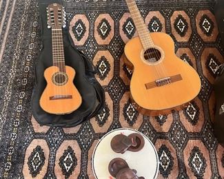 On left armadillo  o right Amada classic guitar model 5453 HG 1/2