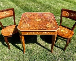 SOLD - RARE FIND Sorrento Italy game table with inlaid marquetry wood.  Includes two chairs.  - Table 30x30x29; Chairs 19x17x34. PERFECT CONDITION! See additional images for hidden "casino" inside! 