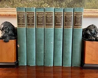 $350 - pair of opposing lion bookends; $70 - The Classics Greek 7 volume set