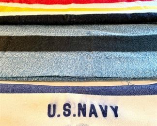 $60 - vintage US Navy wool blanket; $70 - vintage Hudson Bay blue blanket;  $70 - vintage Hudson Bay multi-stripe blanket; $50 - vintage LL Bean wool blanket (listed top to bottom)