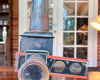 $150 - vintage magic projector  - its super cool!! 