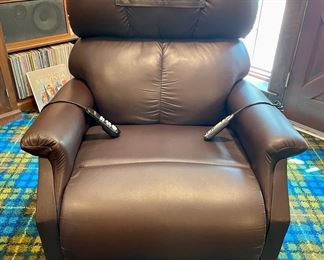 SOLD- LIKE NEW! Barely used, less than one year old. Lift Chair. Espresso color, faux leather. Comfortable and works perfectly. You move. And sorry folks, the groovy carpet is not available...it already sold. :) 