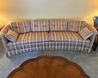 Curved upholstered couch