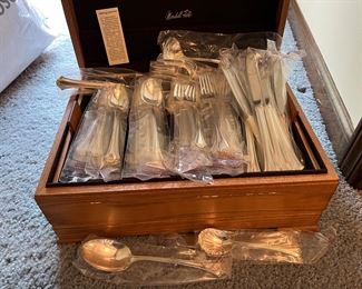 New in packaging Reed & Barton "Country French" stainless steel flatware set - service for 9 plus serving pieces