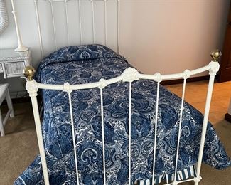 (2) white iron bed frames and mattresses....