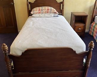 (2) antique twin bed frames and mattresses....