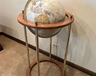 Globe in floor stand