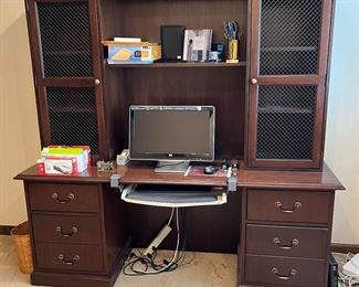 Desk with hutch and office supplies