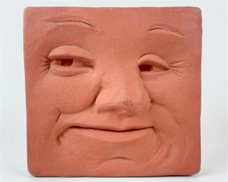 Signed 1999 MCM Smirking Face 4" Wall Art Pottery
