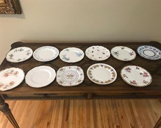 Bunch of plates with matching teacups