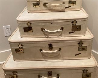 Set of White Vintage Travel Joy Suitcases
