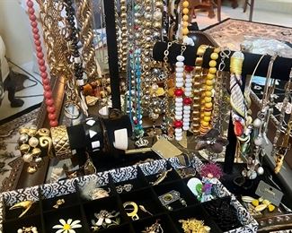 Costume Jewelry 
Lots of Pins/Brooches, Necklaces, and Eartings