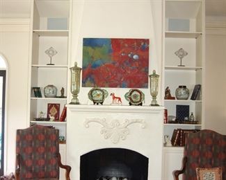 Matching open-arm upholstered chairs