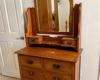 Small Dresser Antique w/glove compartments….Mirror has reflection of the Wardrobe/Admoire