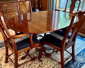 Statton Americana Furniture , Vintage Pieces made in the 1700-1800s Style, Cherry Wood Finish w/3 leaves
Dual Pedestal Table with 6 Dining Chairs 