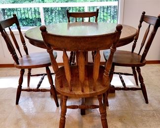 Oak Dinette with gear-driven table top and one extra leaf PRICED TO SELL!