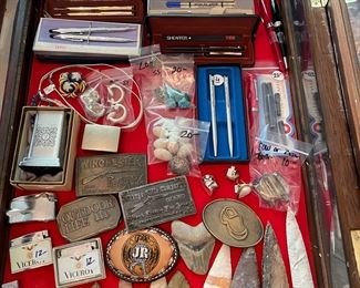 Arrowheads, Lighters, Belt Buckles, Pens, Sterling and Gold Jewelry, etc.