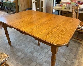 Amish made oak table with leaves and four chairs. Very heavy bring help to load. 