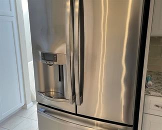 refrigerator  GE profile 36 wide by 70 high and 27 inches deep