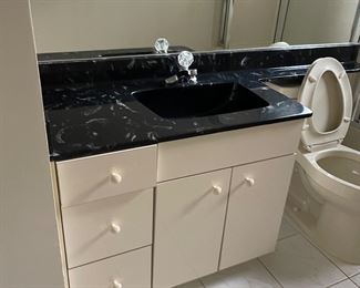 cabinet and faucets
