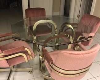 Vintage Glass table with swivel chairs