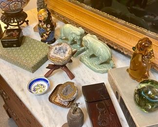 The client retracted the green elephant bookends from the sale and has decided to keep them. 