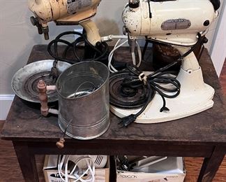 Lots of antique appliances and mixers of all ages