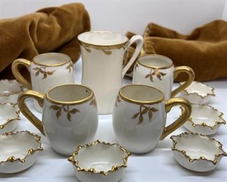 Hutschenreuther White and gold hand-painted dish set