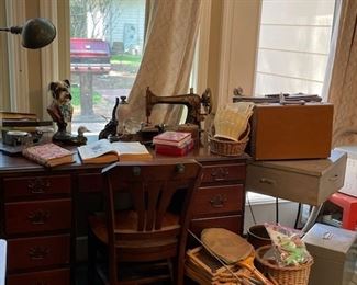Wooden vintage desk with antique and vintage office equipment