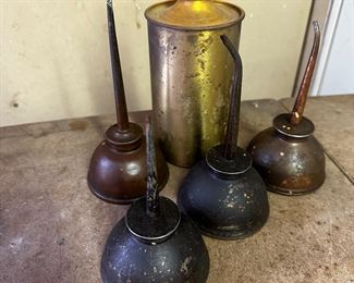 Antique oil cans