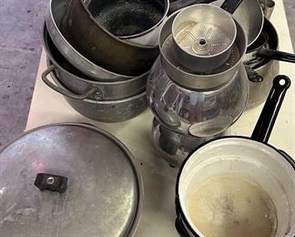 An huge assortment of vintage pots; pans and baking supplies