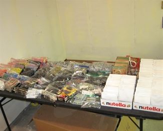 Table full of bow strings, Nock's, Field Tips, and Broadheads 