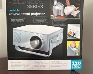 Portable entertainment projector