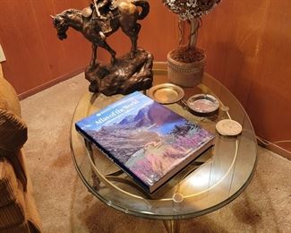 Statue, Glass Topped Lamp Table and Book