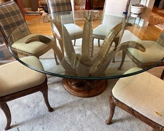 Hollywood Regency Era Carved Leaf Form Italian Dining Table
6 chairs

Dimensions: 
5’ diameter x 29” tall 