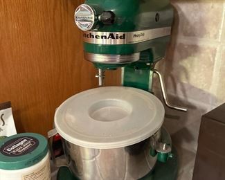 Vintage green Kitchenaid mixer with accessories 