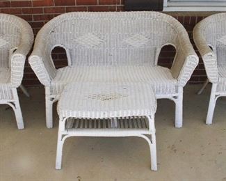 1 - 4 pc. Wicker Patio Set Table: 26" x 17" x 18" Sofa: 52" x 26" x 33" Chairs: 29" x 32" x 22"
