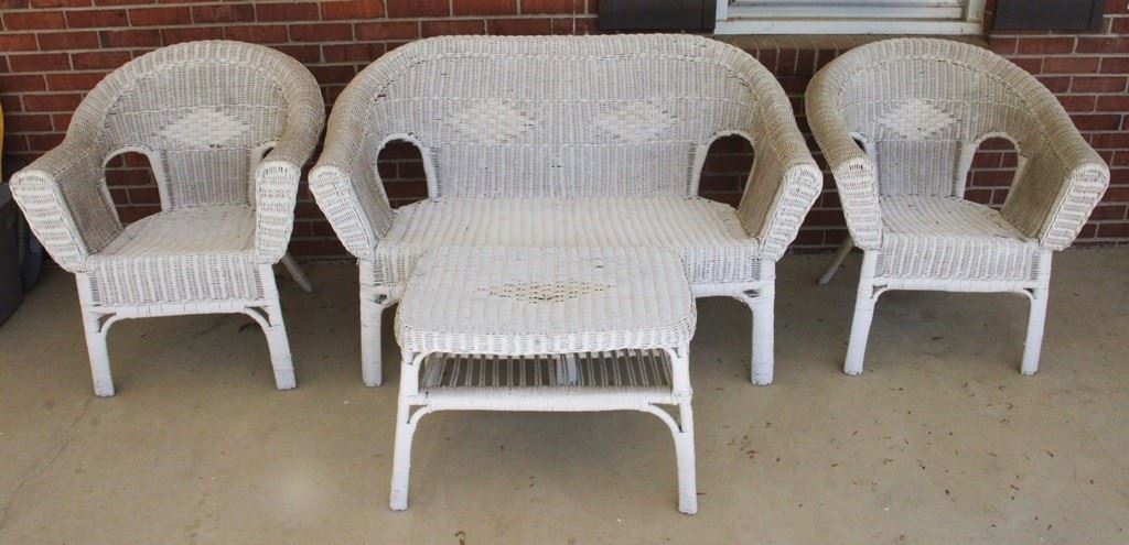 1 - 4 pc. Wicker Patio Set Table: 26" x 17" x 18" Sofa: 52" x 26" x 33" Chairs: 29" x 32" x 22"
