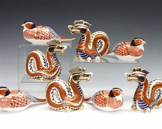 Eight 20th century Royal Crown Derby "Imari" pattern fine bone china figures.  Includes four dragons and four pheasants.  Printed marks in Red with "LII".  Good condition, very slight surface wear, two with silver stoppers, some with printed marks scratched through.  Up to 7" long and 4 1/2" high.