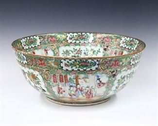 A Chinese Rose Medallion porcelain bowl.  Round form with polychrome vignette panels depicting alternating floral and Court scenes with Gilded detail.  Unmarked.  Minor wear to decoration.  15 3/4" diameter, 6 1/2" high.  ESTIMATE $300-400
