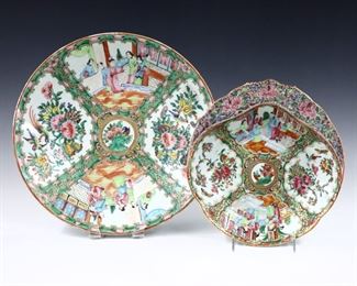 Two Chinese Rose Medallion porcelain dishes.  Includes a charger and a shrimp plate with polychrome vignette panels depicting alternating floral and Court scenes with Gilded detail.  Unmarked.  Some wear to decoration, charger with firing cracks at underside.  Up to 13 1/2" diameter.  
