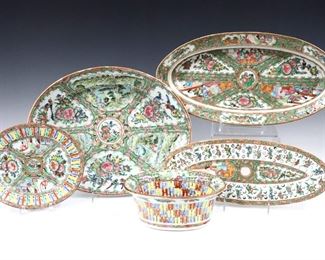 Three Chinese Rose Medallion porcelain dishes.  Includes a long platter with strainer insert, an oval platter and a chestnut basket with underplate with polychrome vignette panels depicting alternating floral and Court scenes with Gilded detail.  Unmarked.  Some wear to decoration and minor damage overall, larger platter with chips to rim.  Up to 16 1/4" long.  ESTIMATE $300-500
