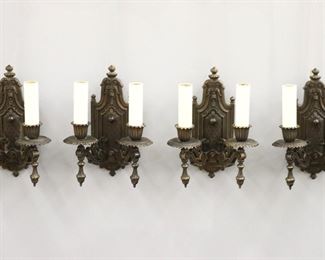 Four early 20th century Gothic Revival Period wall sconces.  Cast Brass bodies with foliate design and double arms.  Restored finish, re-wired.  Each 9" wide x 11 1/2" high.  ESTIMATE $400-600
