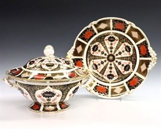 A 20th century Royal Crown Derby "Old Imari" pattern fine bone china covered tureen and underplate.  Printed marks in Red with "1128" and "LII".  Good condition, very slight surface wear.  Underplate is 13" diameter, tureen 9 1/2" high.  
