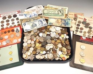 200 plus World coins and some paper notes.  Primarily 20th century including European, African, Asian and The Americas, includes coin sets from Thailand, Turkey, Nepal, Seychelles and St. Helena.  All circulated and Primarily in good condition.  ESTIMATE $200-300