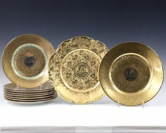 A 1930's Royal Bavarian Hutschenreuther Selb porcelain service set with 24k Gold and Platinum "encrusted" decoration, twenty-six pieces total.  Partial set, includes a 11" 50th Anniversary charger, a 10" dinner plate, 8 x 8 1/2" salad plates, a 6" teapot, a 4" creamer, a 4 1/2" covered sugar, 3 x 2 3/4" teacups with 4 saucers, and 6 x 6" soups.  Printed marks in Green and Gold.  